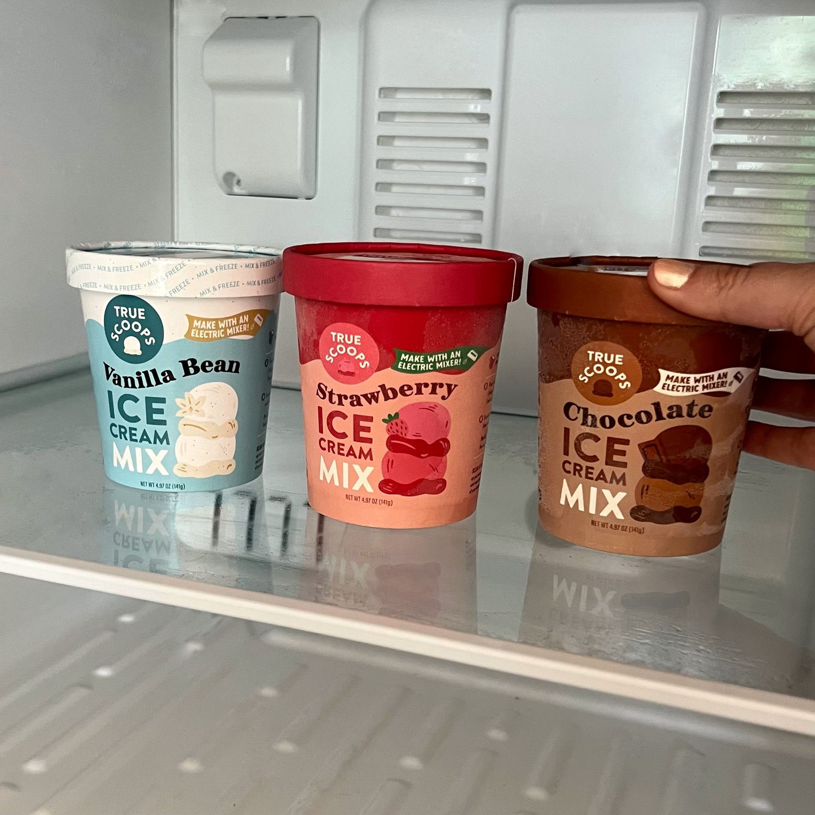 Selected Focused on Ice Cream in a Plastic Container and Displayed